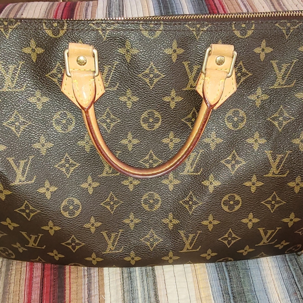 Official Louis Vuitton Speedy Bag with key Lock